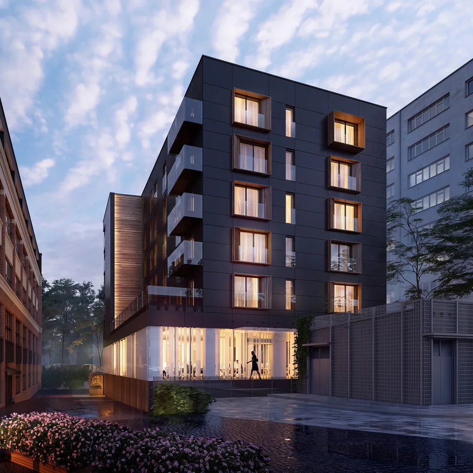 Kwadratowy kadr wizualizacji budynku miniapartamentów z detalem elewacji i zielenią